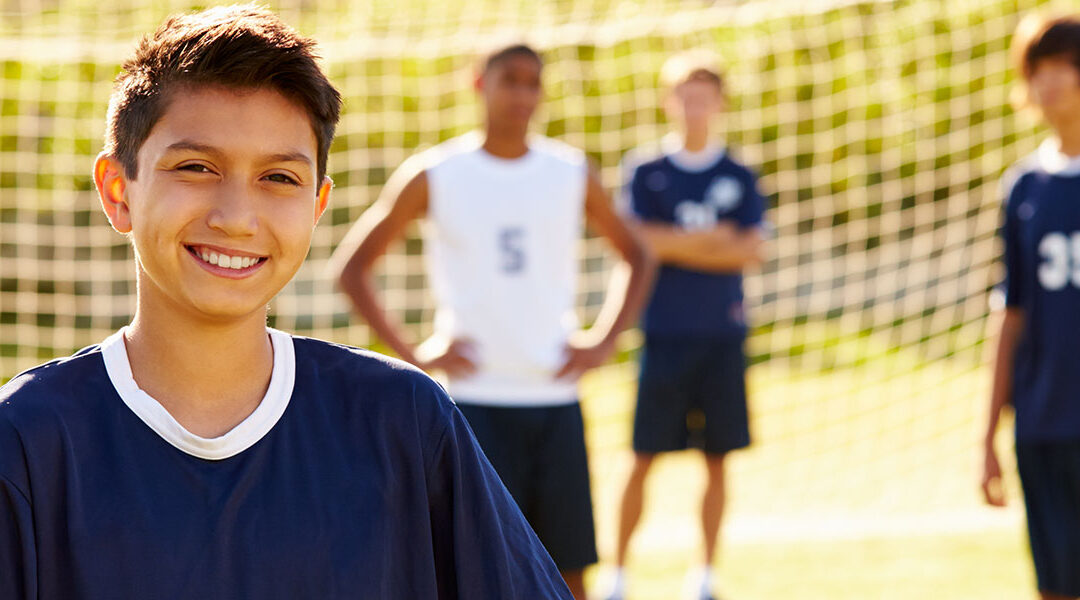 older-kids-playing-soccer-header